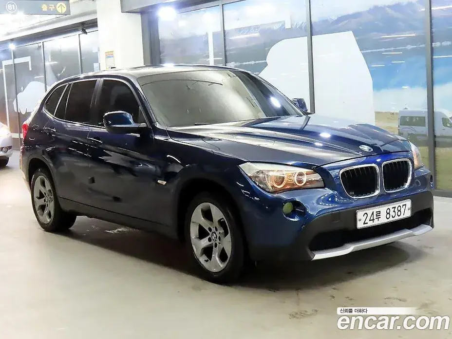 BMW X1 2011 — фото 1